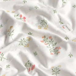 Delantal de algodón con estampado de flores Florgu