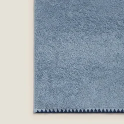 Toalla de baño con pespunte Unimax